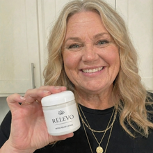 Customer holding the RELEVO lotion jar