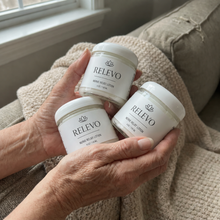 Three jars of RELEVO Nerve Relief Lotion